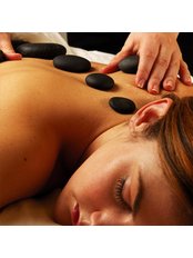 Hot Stone Massage - Wholistic Wellness Chinese Acupuncture & Massage