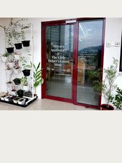 Mayura Apothecary - Front door with a small herbs garden