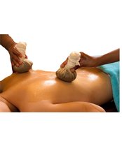 Body TreChurna Pinda Sweda (Warm Herbal Powder bag Massage) atment - AyurVilla