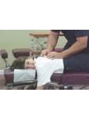 Child Chiropractic Adjustment - Back To Health