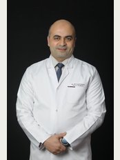 Dr Azmy Plastic Clinic - 19 Al Batal Ahmed Abd El Aziz , care & cure clinics, Mohandsin, Giza, 