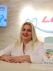 Dr Enkelejda Spahiu -  at Klinika Dentare Ledismile