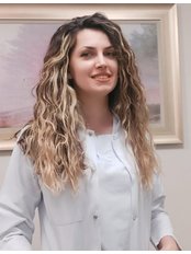 Dr Brunilda  Sharra - Dentist at Klinika Dentare
