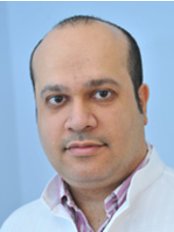 Dr Haitham Al Jishi -  at Al Jishi Specialist Dental Centre