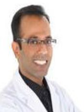 Dr Hussein Shivji - Dentist at Asante Dental Centre New Westminster