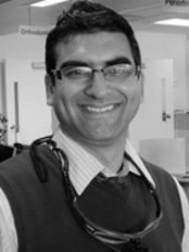Dr Neeraj Bansal - Doctor at Affordable Dental Implants - Brockville