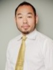 Dr Grant Yiu -  at Guelph Line Dental
