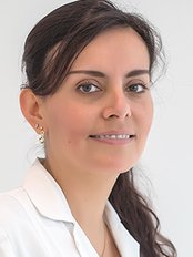 Ms Auris Pacheco -  at Clinique Dentaire Savaris