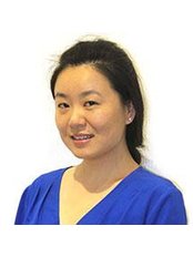 Dr Qi Li Song -  at Denticare Clinic
