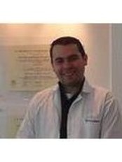 Dr Hector Quintero Andres Tamayo - Dentist at Implant Dent Clinica Odontologica