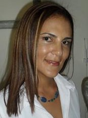 Dr Adriana Patricia Munera Garcia - Dentist at Dental Clinic O.C.I. - San Jose