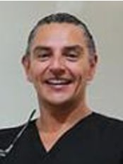 Dr Alberto  Meza - Dentist at Meza Dental Care Clinic