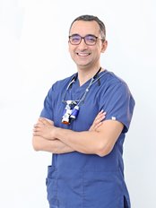 Prof Karim Fawzy, BDS, MSc, PhD, MFDS-RCSEd, Dr. med. dent. - Principal Dentist at Dr. Karim Fawzy's Dental Clinic