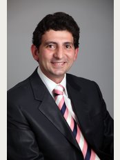 Ultra Dental Care & Esthetic Dental Center - Dr. Ahmed Abdelhalim ElSayed, Consultant of Cosmetic Dentistry & Implantology