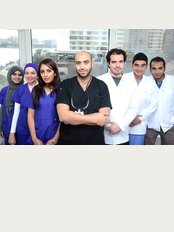 Al Fawzy Dental Clinic - Dokki - 108 Tahrir St, Dokki Metro Station, Dokki Square, Dokki, 