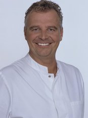Dr Koty - Principal Dentist at The Munich Dental Clinic