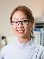 Dr Lois Law - Dentist at Orthodontic and Children’s Dental Center - Kowloon