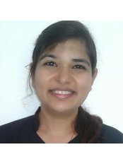 Dr Ami Chotaliya - Doctor at 32 Pearls - Multispeciality Dental Clinic & Implant Center