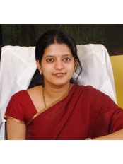 Dr Beena Roopak M.D.S - Oral Surgeon at Braces N Faces Dental Clinic