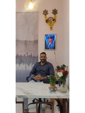 Dr Manjit Singh - Dentist at Charmin' Smile Dental Clinic