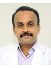 Dr Santosh VC -  at MIDAC Dental Centre