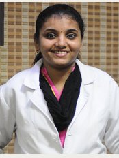 Srivari Dental Clinic - Dr.Suganya Bejoy