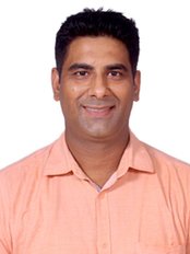 Dr Suresh Mukhija - Dentist at Krisshnaa Dental & Multispeciality care