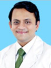 Dr Ruchir Mishra - Oral Surgeon at Smilekraft Multispeciality Dental Clinic Hyderabad