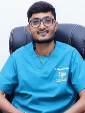 Dr Vijay Timbadiya - Principal Dentist at JDCC Best Dental Clinic In Jamnagar