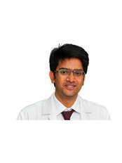 Dr Gautam Vishnubhotla -  at Sridevi Dental Clinic