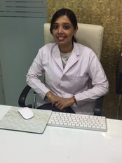 Dentium Dental Care - Dr.Shubhada Sharma Bharadwaj 
