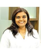 Dr Urvi Ashar - Dentist at Roots Dental Clinic