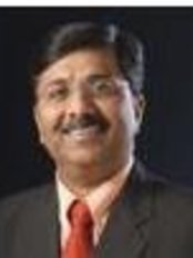 Dr Ashok Karad - Dentist at SmileCare
