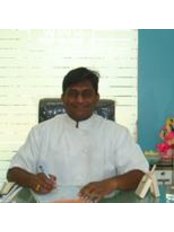 Dr Abhay Datarkar - Oral Surgeon at Dr. Datarkar Dental and Implant Centre