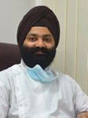 Kanwar Nanda - Principal Dentist at Dr Nanda's Multispeciality Dental Clinic