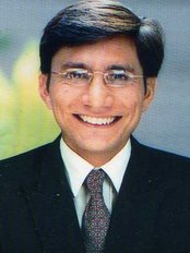 Dr Sanjay Jain - Dentist at Lilly White Dental Clinic