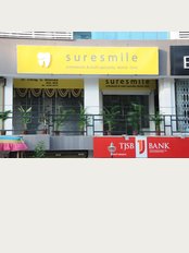 Suresmile Multi-speciality Dental Clinic - 1st Floor, Business Bay, Royal Park, Street No. 6, opp. Krishna Medicine, Kalavad Road, Rajkot, India, 360005, 