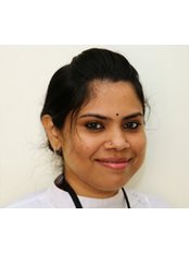 Dr Santhini Jyothish - Dentist at Kamala Dental Speciality Hospital