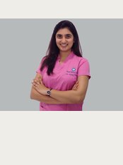 Monarch Dental Clinic - Vadodara - Dr. Aesha Patel