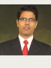 Vishnoi Dental Clinic & Implant Centre, - Dr Shivlal Vishnoi