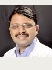Dr. Vineet Bansal, Dental Implantologist - Dr. Vineet bansal,Dental implantologist