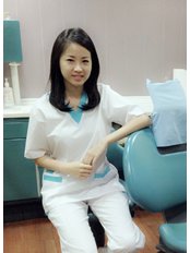 Ms Cory Sridjaja - Dentist at Hendra Hidayat Implant Center