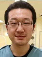 Dr Yasutaka Iwata - Dentist at Cosmo Sakae Dental Clinic