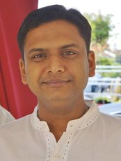 Dr Bala Saravanan - Associate Dentist at The Dentist QHC