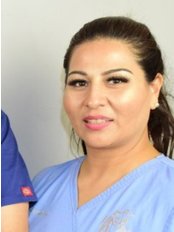 Dr Hermnia Marin - Dentist at Lux Dental