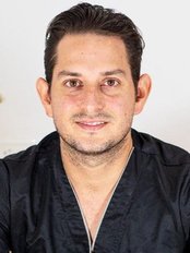 Dr Ricardo Azcorra - Dentist at Dentaria