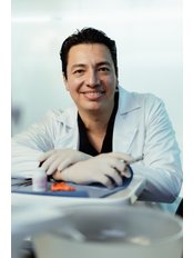 Dr Gilberto  Alvarez - Dentist at A1 Smile Design