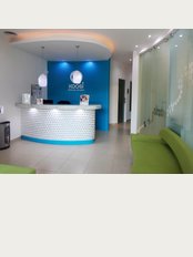 Koosi Dental Studio - Front desk & waiting room