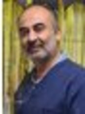 Dr Hector Santillana - Doctor at Clinica Dental
