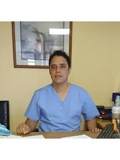 Dr. Arnulfo  Vazquez - Dentist at Dental Implant Clinic